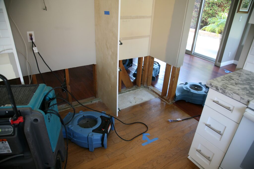 Dehumidifiers And Air Movers To Dry Out Flooded House
