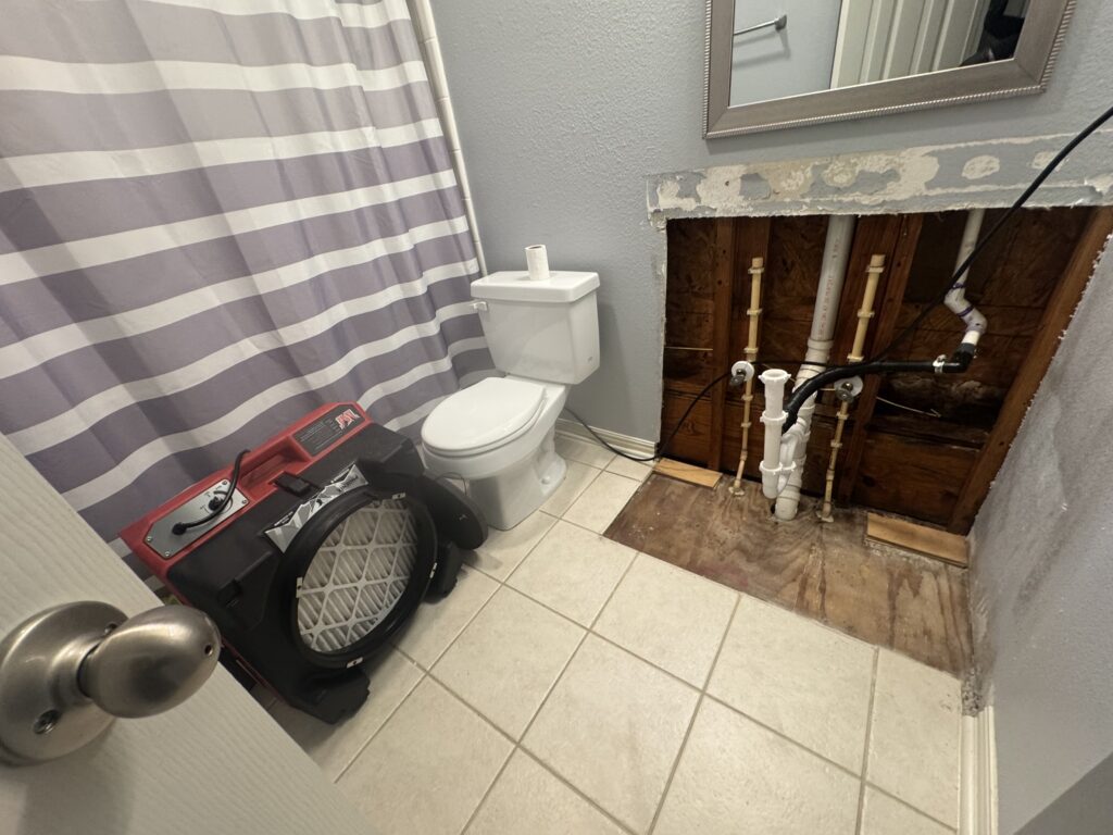 water damage bathroom drying process